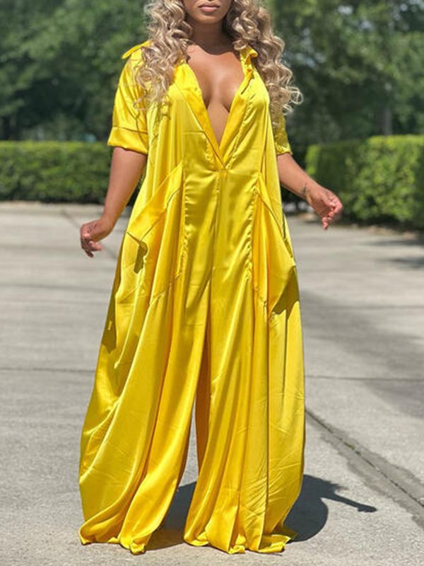 Jumpsuit mit tiefem Ausschnitt und weitem Bein – Ausverkauf