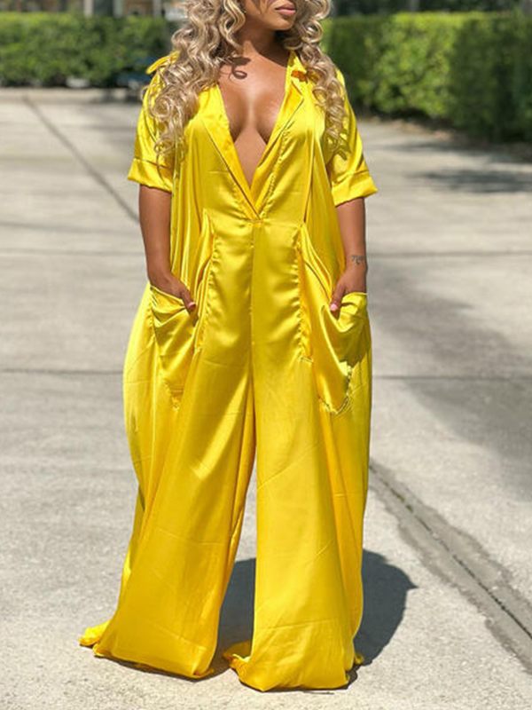 Jumpsuit mit tiefem Ausschnitt und weitem Bein – Ausverkauf
