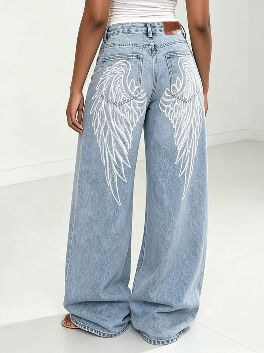 Large Wing Print Washed Denim Pants for Streetwear