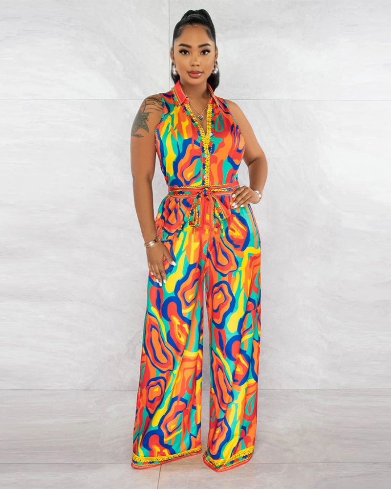 THE “CATCH A VIBE” JUMPSUIT ORANGE
