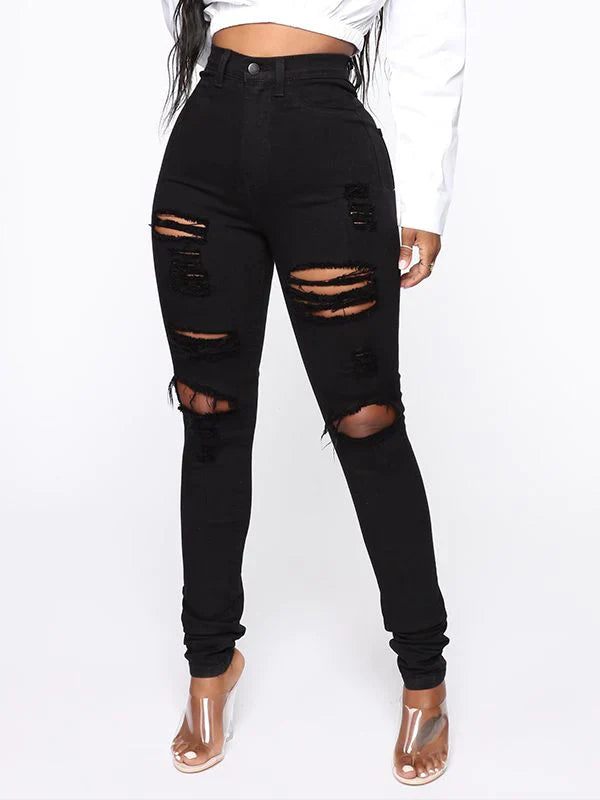 Zerrissene Röhrenjeans