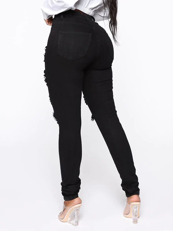 Zerrissene Röhrenjeans