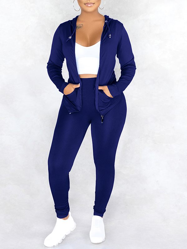 Einfarbiges Set mit Kapuzenpullover und Hose mit Reißverschluss