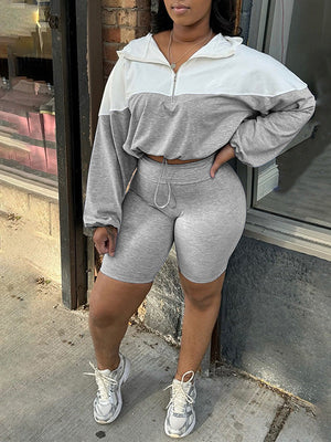 Zweifarbiges Set aus Kapuzenpullover mit Reißverschluss und Bikershorts – Ausverkauf