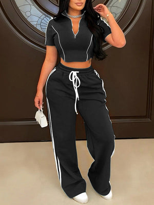 Indiebeautie – Gestreiftes Set aus Oberteil und Hose mit Reißverschluss