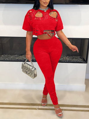 Zerrissenes T-Shirt und Hosen-Set