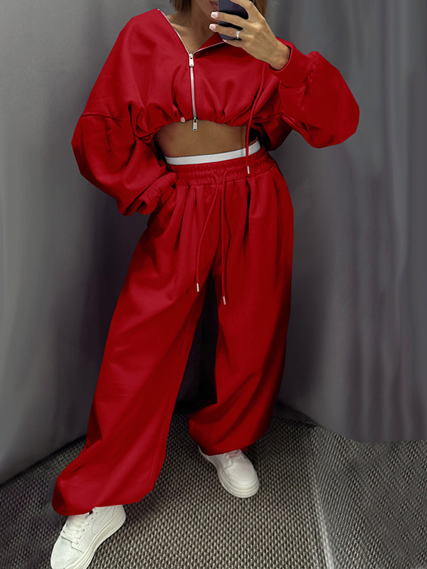 Set aus Kapuzenpullover mit Reißverschluss vorne und Hose mit weitem Bein