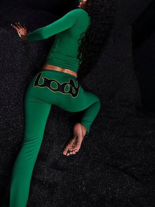 Set aus Oberteil und Hose mit Reißverschluss und Logo