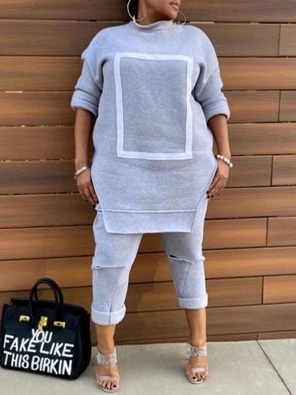 Ensemble sweat-shirt fendu sur le côté et pantalon déchiré