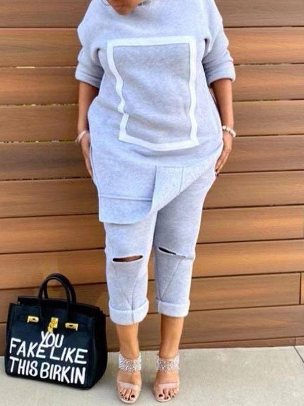Ensemble sweat-shirt fendu sur le côté et pantalon déchiré
