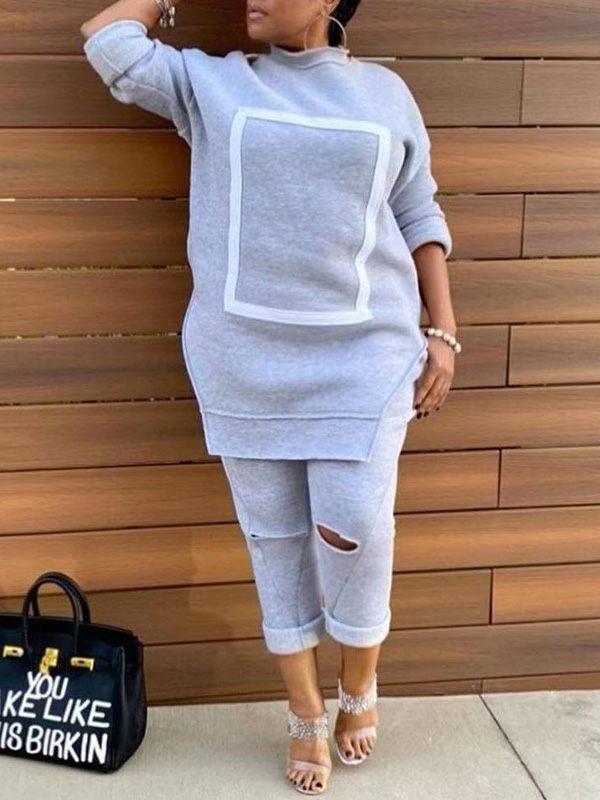 Ensemble sweat-shirt fendu sur le côté et pantalon déchiré